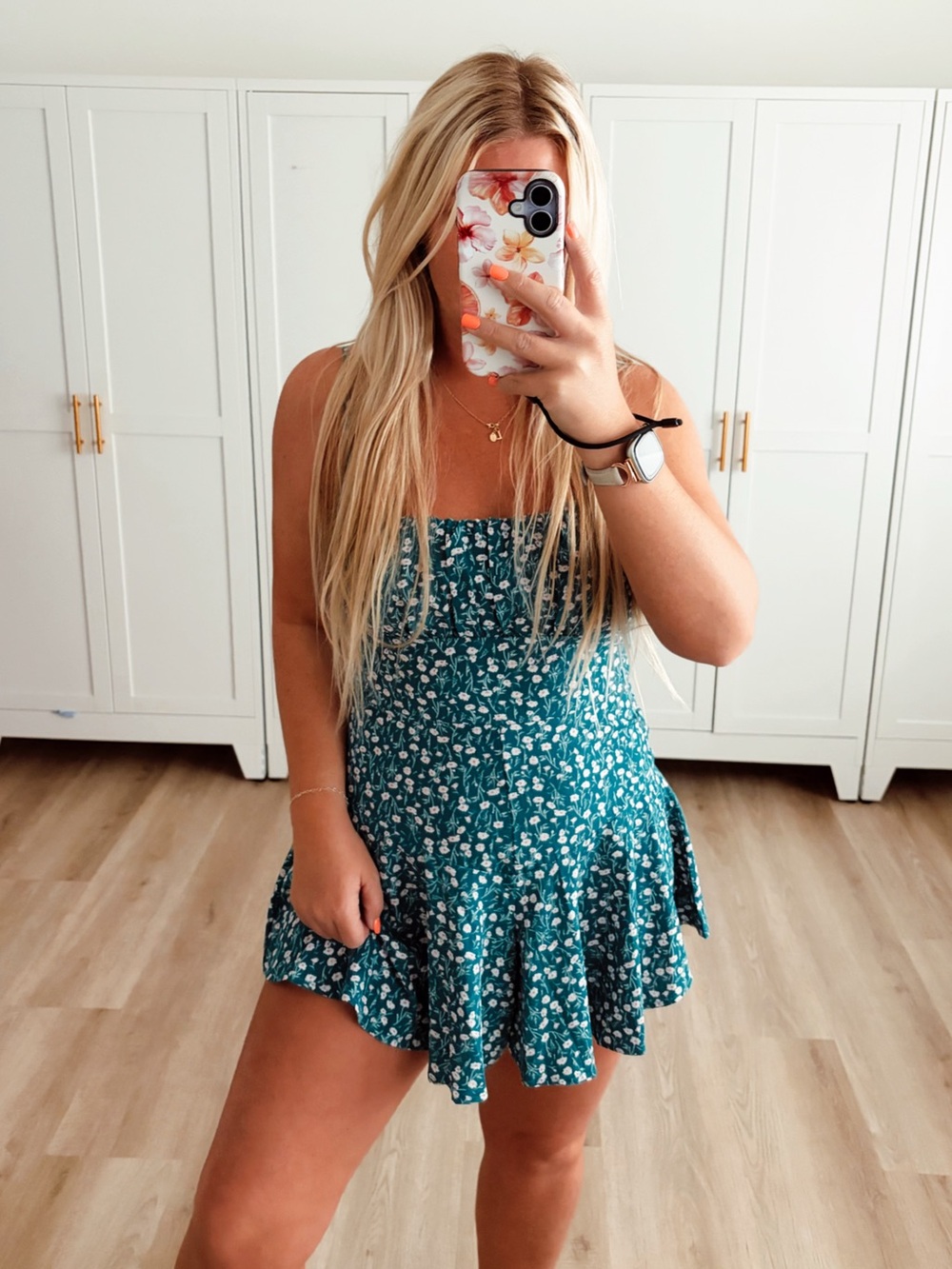 Green and white floral flowy romper
